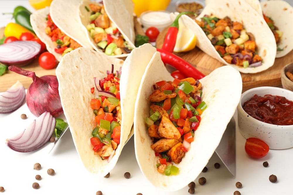 Concept of tasty food with taco close up